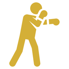 Box & Burn Yellow pictogram of a person in a boxing stance, wearing boxing gloves, facing right.